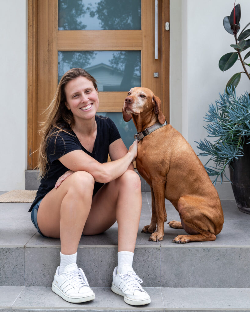Pet sitter in Coffs Harbour spending time with a dog during in-home care